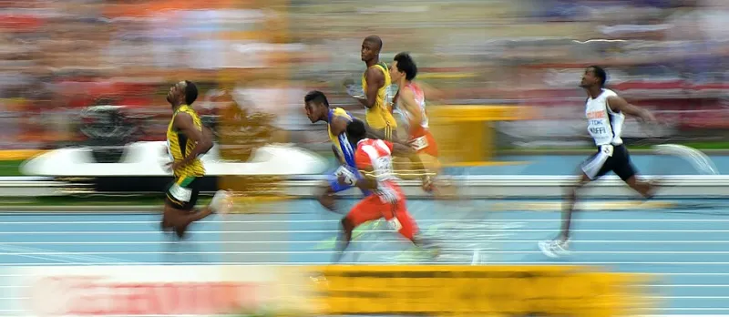 9.58 and Falling: How the 100-Meter World Record Broke Itself Across a Century of Sprinting